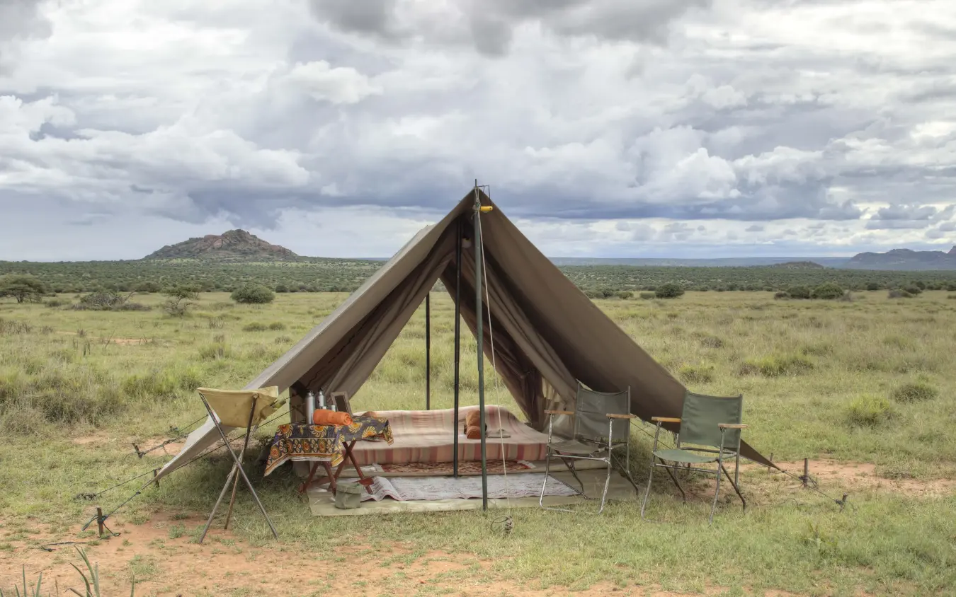 Canvas safari tent camp in expansive savanna landscape, Karisia Walking Safaris, Laikipia Highlands, Kenya