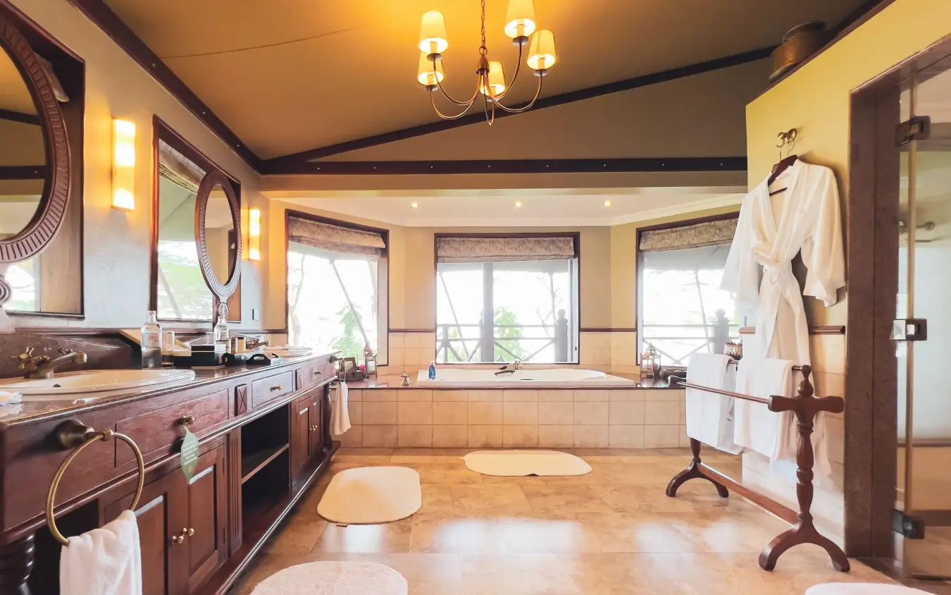 Luxury bathroom with soaking tub and scenic landscape views, Lake Elmenteita Serena Camp, Rift Valley Lakes, Kenya
