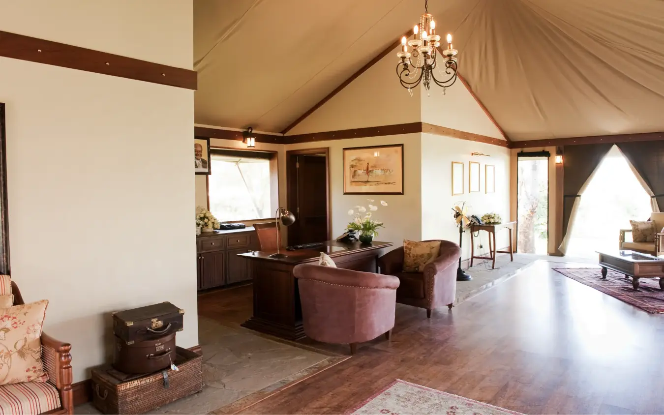 Luxury tent interior with lounge seating and wooden furnishings, Lake Elmenteita Serena Camp, Rift Valley Lakes, Kenya