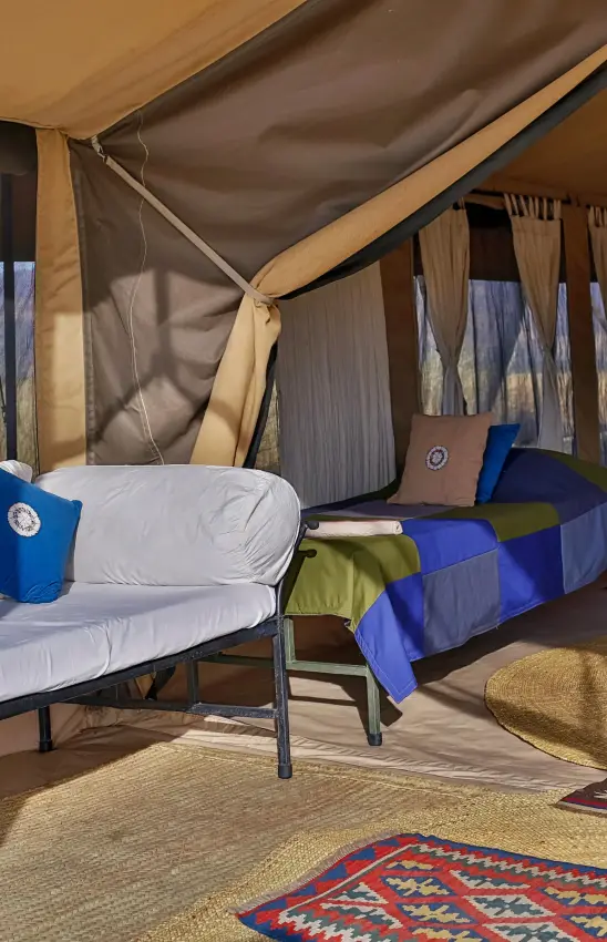 Interior of canvas safari tent with two beds, Lake Natron Camp, Lake Natron, Tanzania