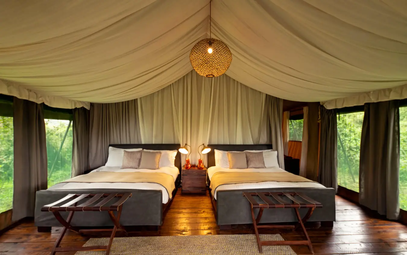 Twin beds in spacious tent with draped ceiling, Lemala Ngorongoro, Ngorongoro Crater, Tanzania
