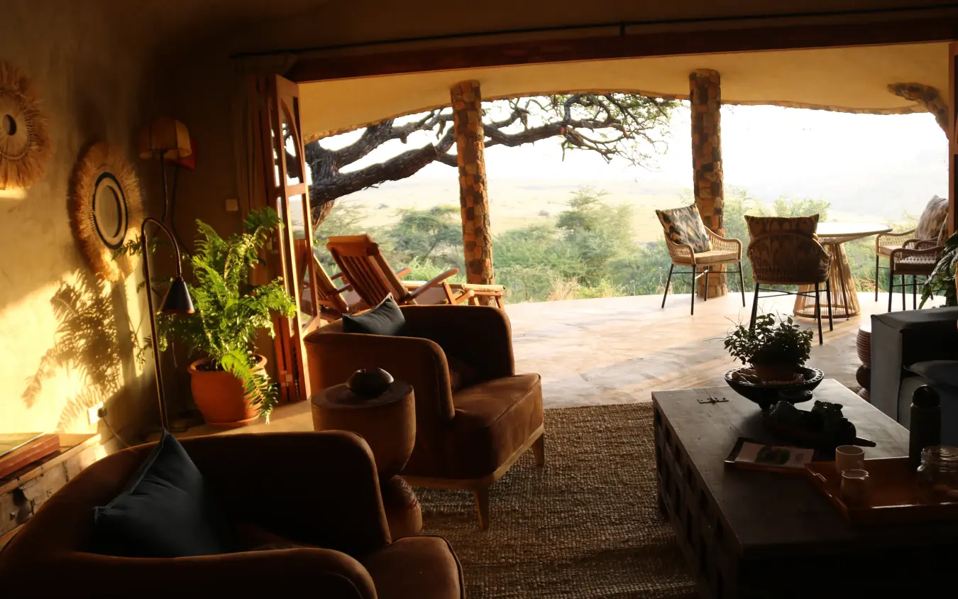 Open-air lounge with canvas canopy overlooking savanna landscape, Lewa House, Laikipia Highlands, Kenya