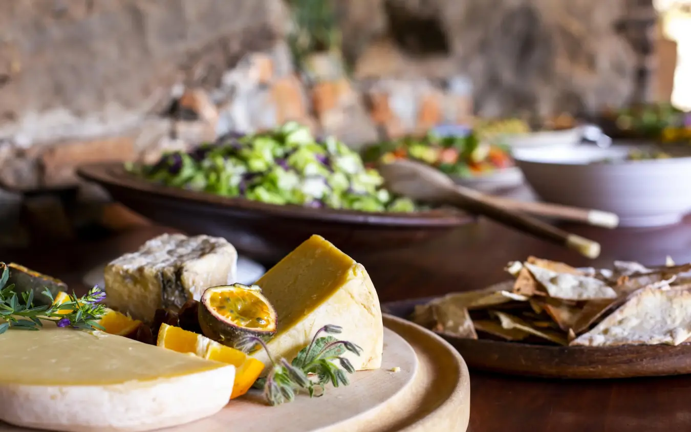 Plated cheese and citrus with fresh herbs and crackers, Lewa Wilderness, Laikipia Highlands, Kenya
