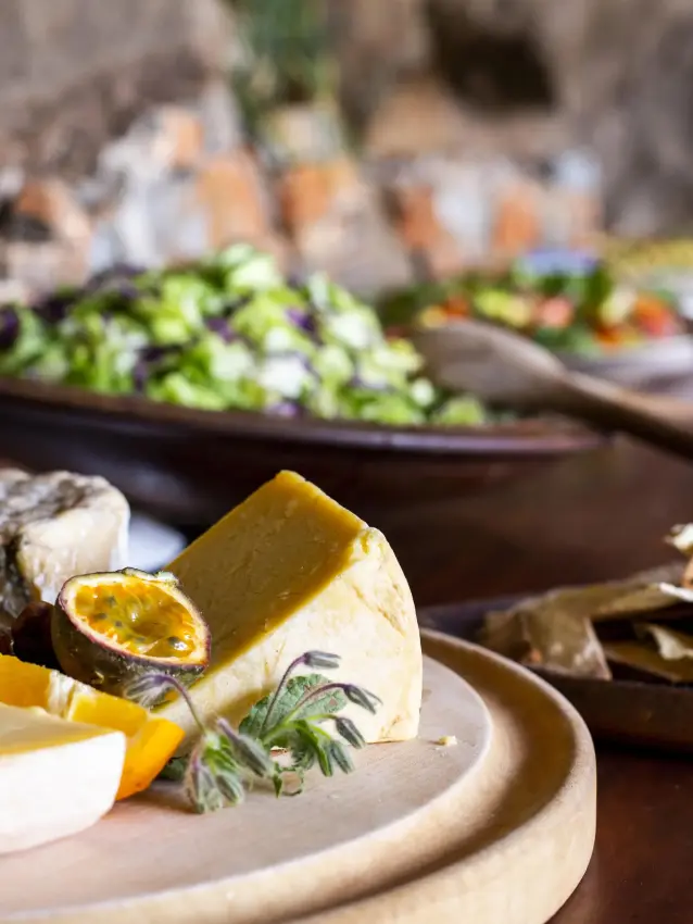 Plated cheese and citrus with fresh herbs and crackers, Lewa Wilderness, Laikipia Highlands, Kenya