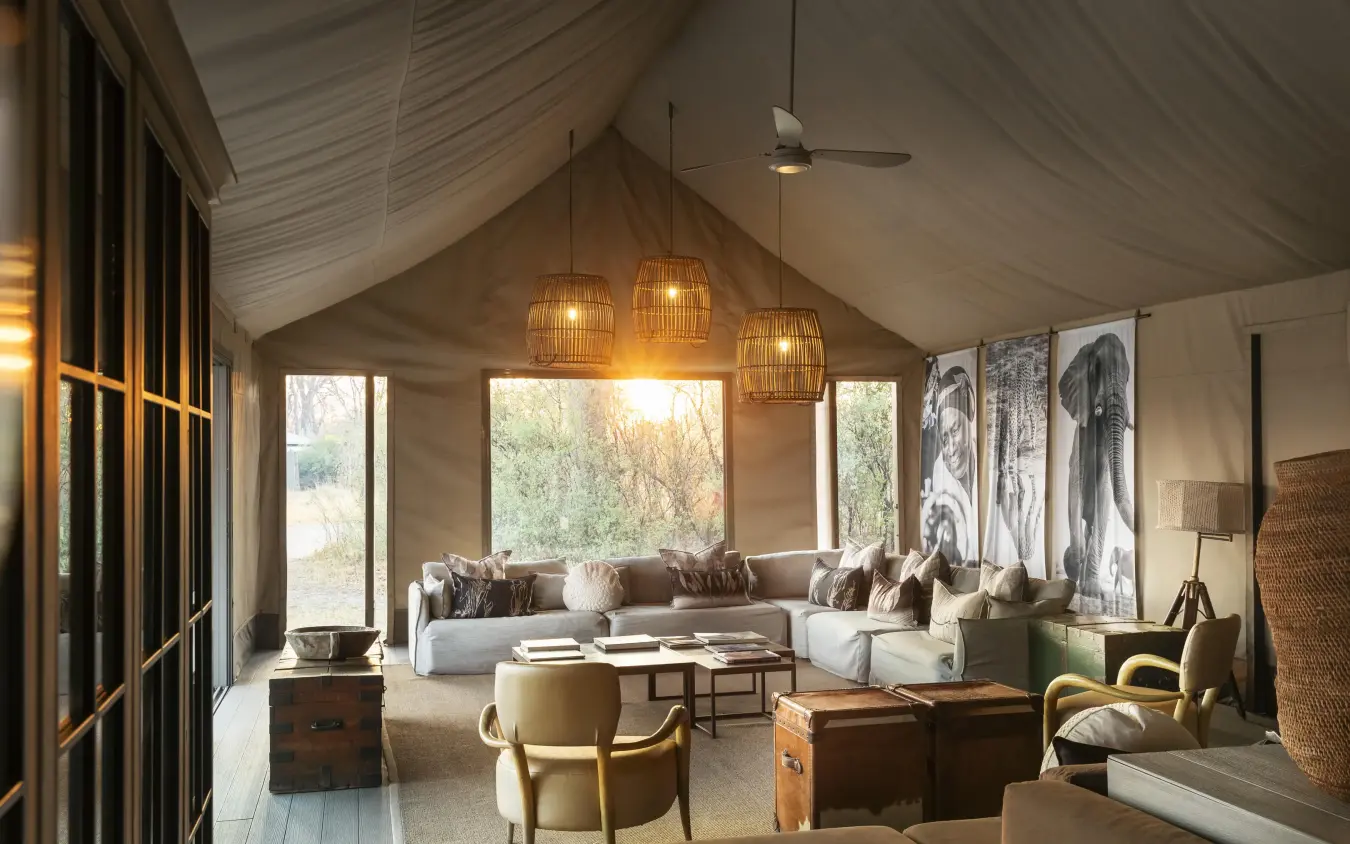 Canvas-draped lounge with natural light and pendant lamps, Linkwasha Camp, Hwange National Park, Zimbabwe