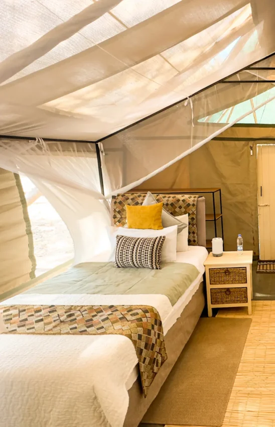Twin beds in safari tent with canvas interior, Little Vundu, Mana Pools, Zimbabwe