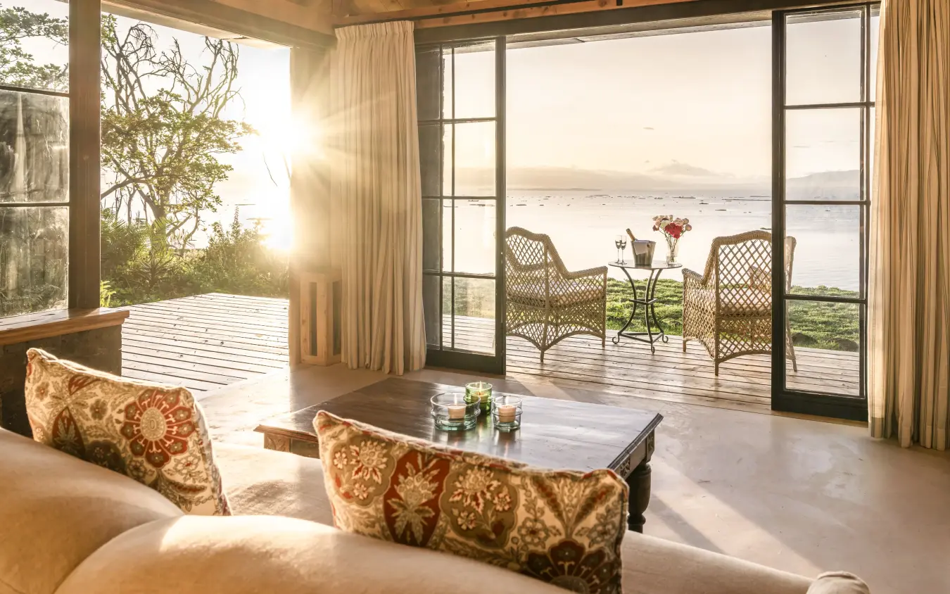 Luxury suite with panoramic water view and coastal landscape at sunrise, Loldia House, Rift Valley Lakes, Kenya