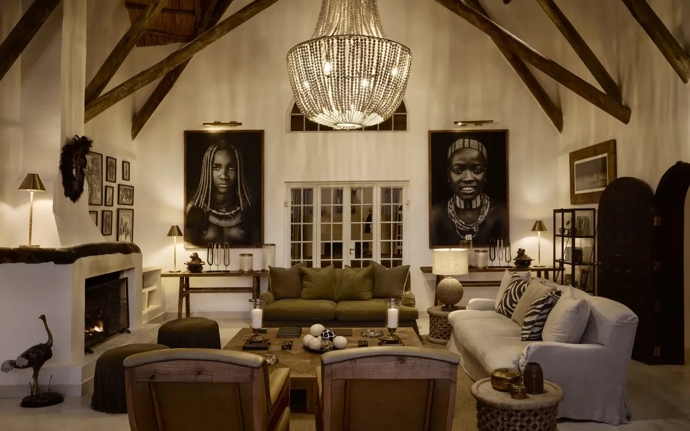 Luxury lodge interior with African art and exposed timber beams, Mama Simba, Arusha, Tanzania