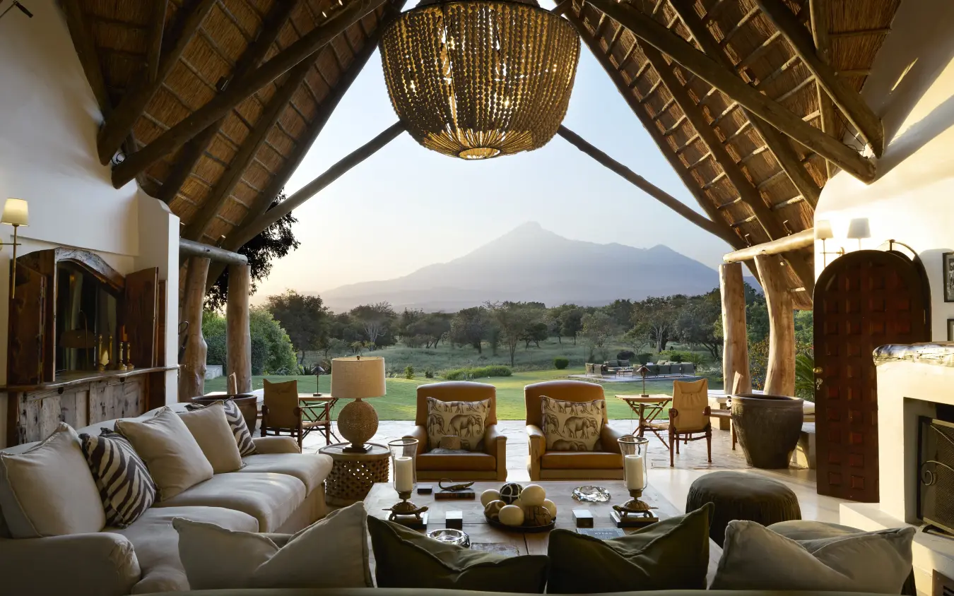Open-sided lounge pavilion with mountain views across valley landscape, Mama Simba, Arusha, Tanzania