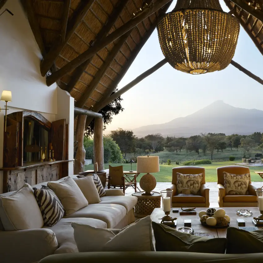 Open-sided lounge pavilion with mountain views across valley landscape, Mama Simba, Arusha, Tanzania