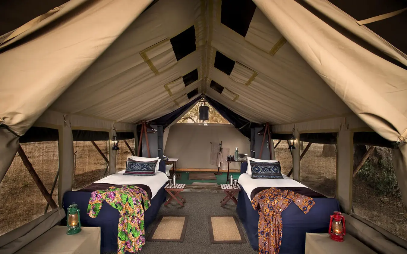 Interior view of luxury safari tent with twin beds, Zambezi Expeditions, Mana Pools, Zimbabwe