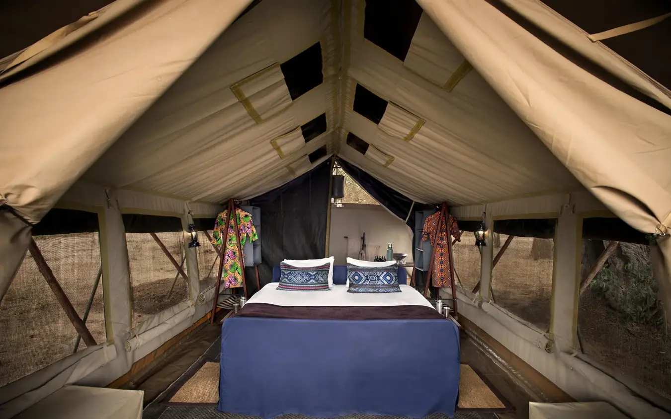 Interior view of canvas safari tent bedroom with bed, Zambezi Expeditions, Mana Pools, Zimbabwe