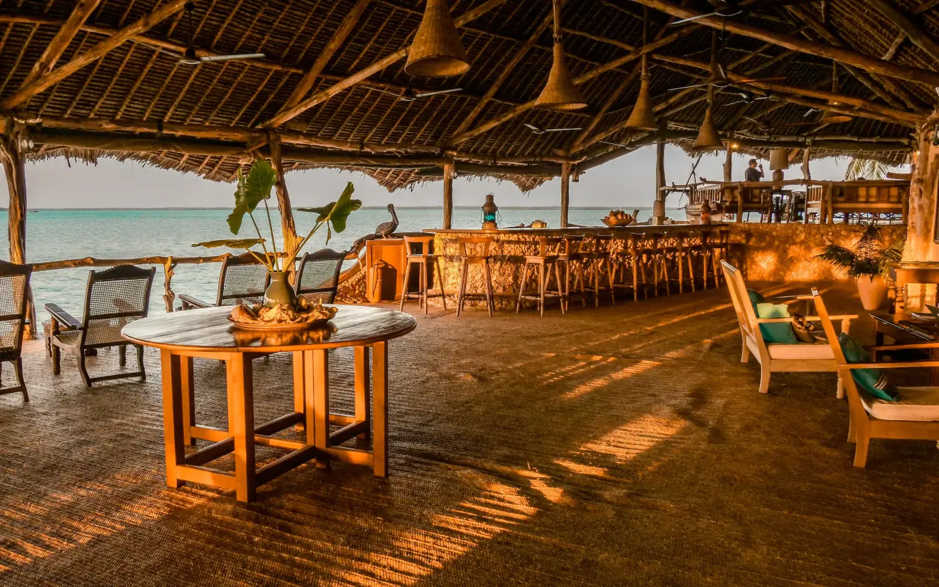 Beachfront dining pavilion with turquoise water view, Manda Bay, Lamu Archipelago, Kenya