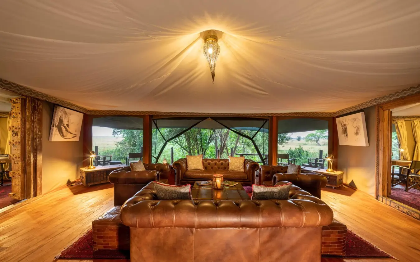 Luxury safari lounge with leather furnishings and canvas ceiling, Mara Plains Camp, Maasai Mara, Kenya