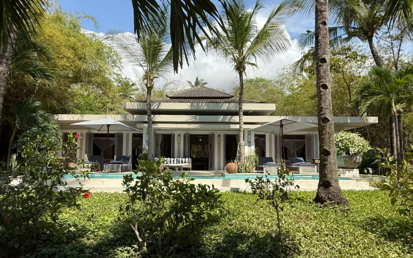 Modern villa with pool surrounded by lush tropical gardens and palms, Maya Kobe, Kilifi, Kenya