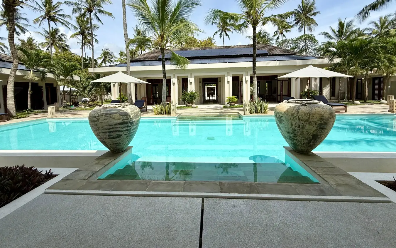Luxury resort pool with tropical palms and modern pavilion architecture, Maya Kobe, Kilifi, Kenya