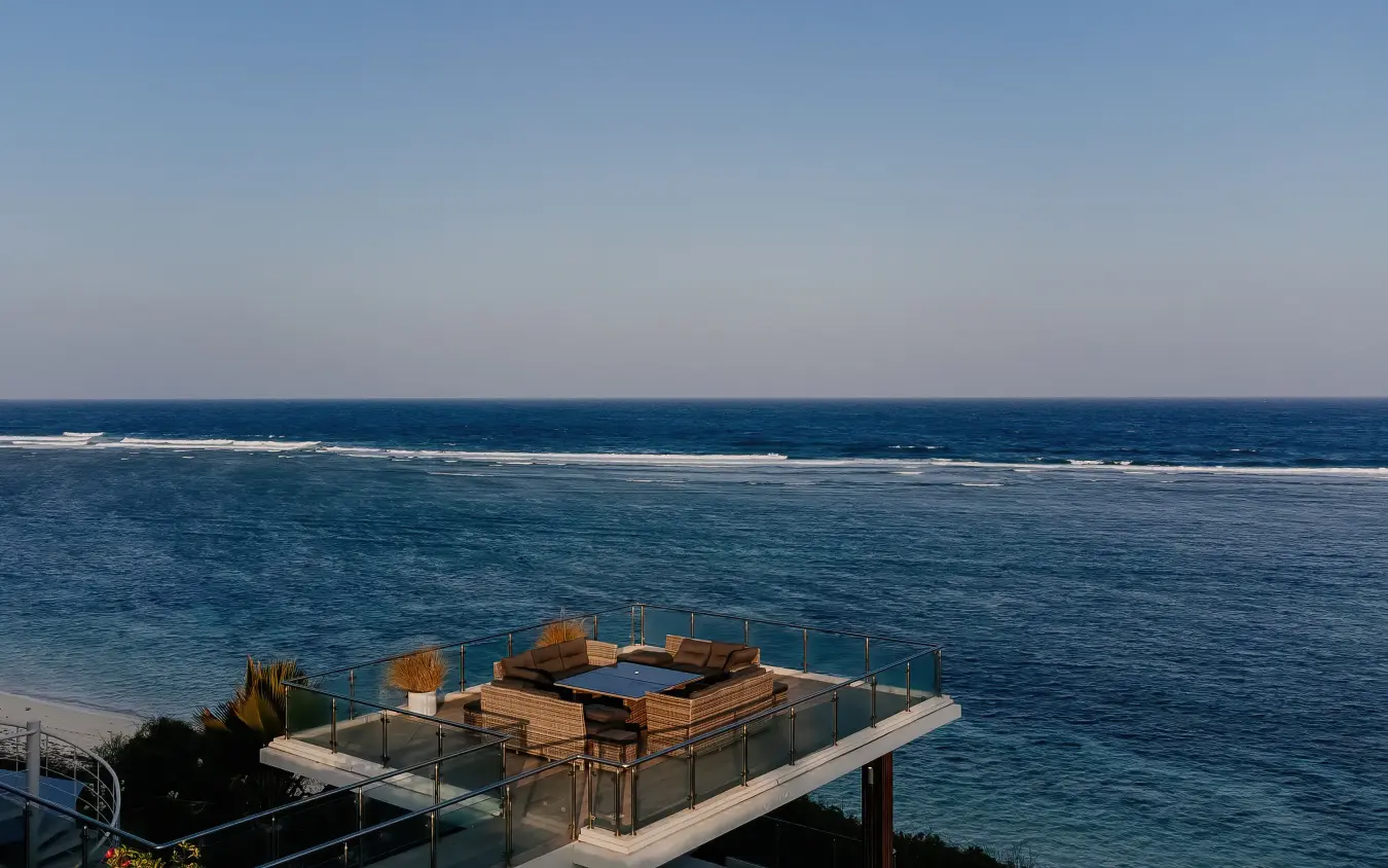 Wooden deck platform with seating overlooking turquoise ocean waters, My Amani, Kilifi, Kenya