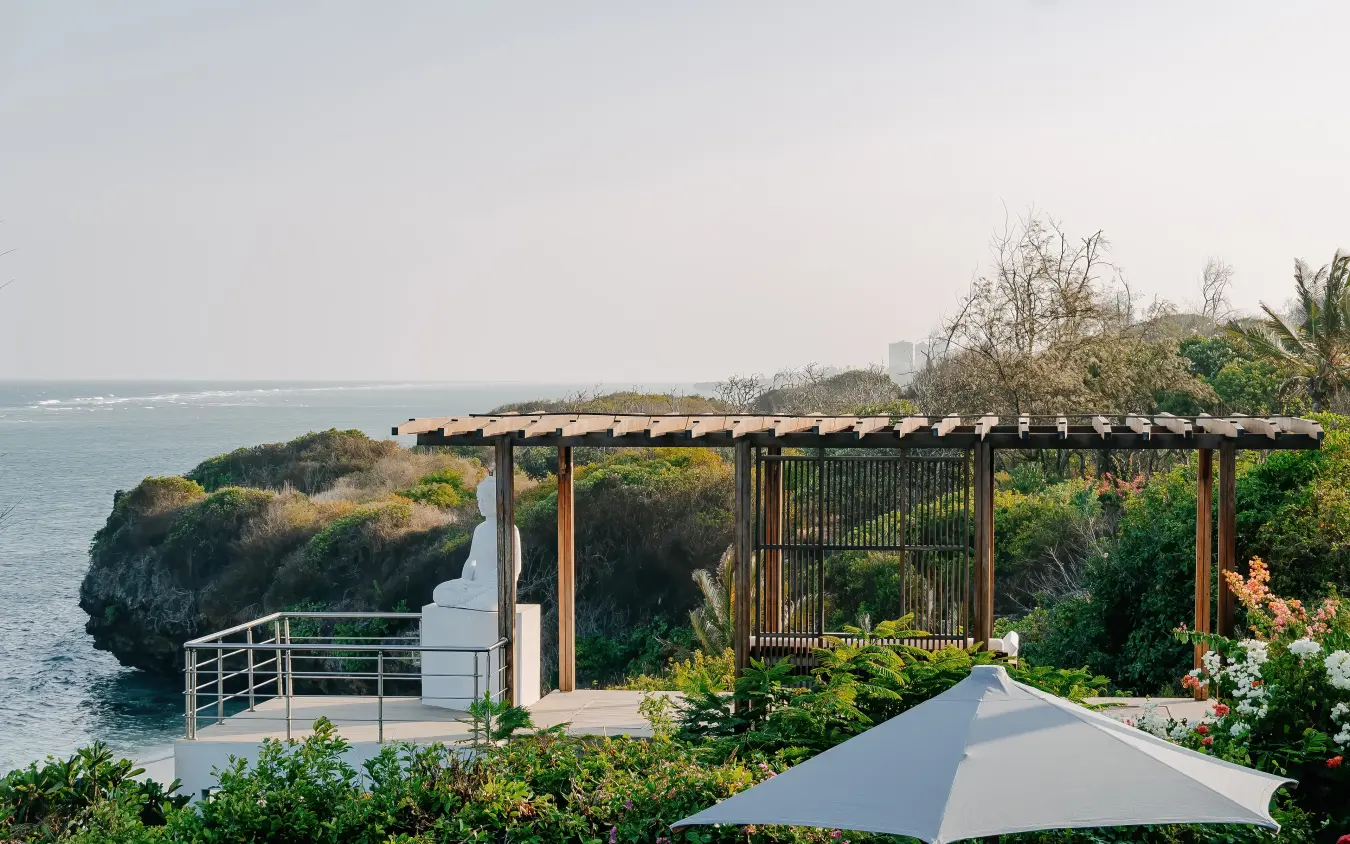 Clifftop terrace with wooden pergola overlooking coastal ocean views, My Amani, Kilifi, Kenya