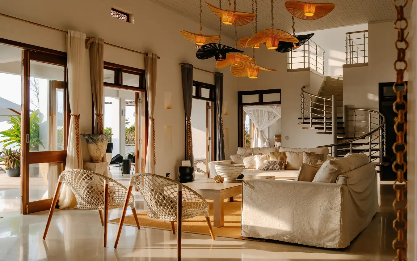 Modern lodge interior with suspended pendant lights and spiral staircase, My Amani, Kilifi, Kenya