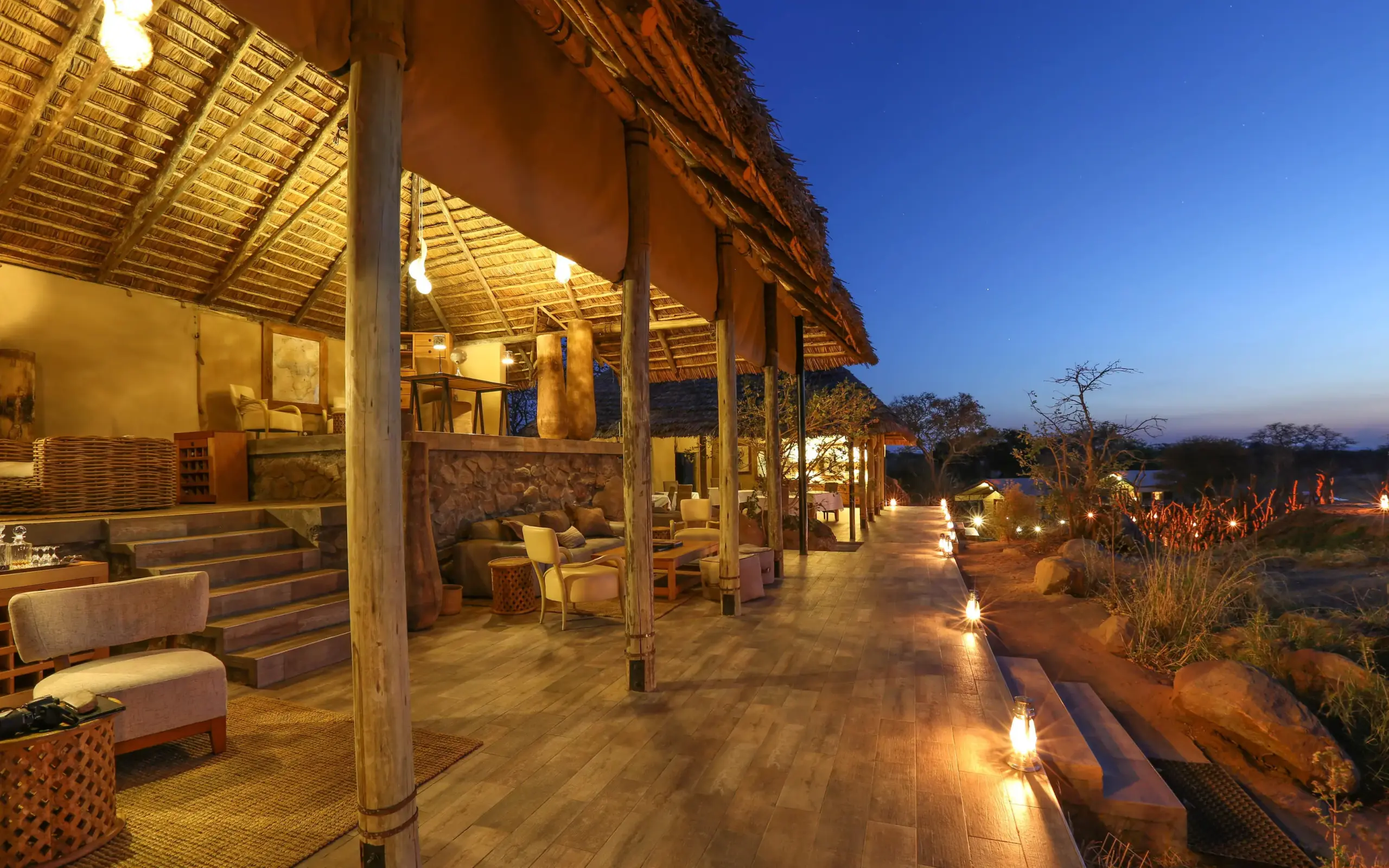 Evening terrace with warm lighting and savanna views, Nimali Tarangire, Tarangire National Park, Tanzania