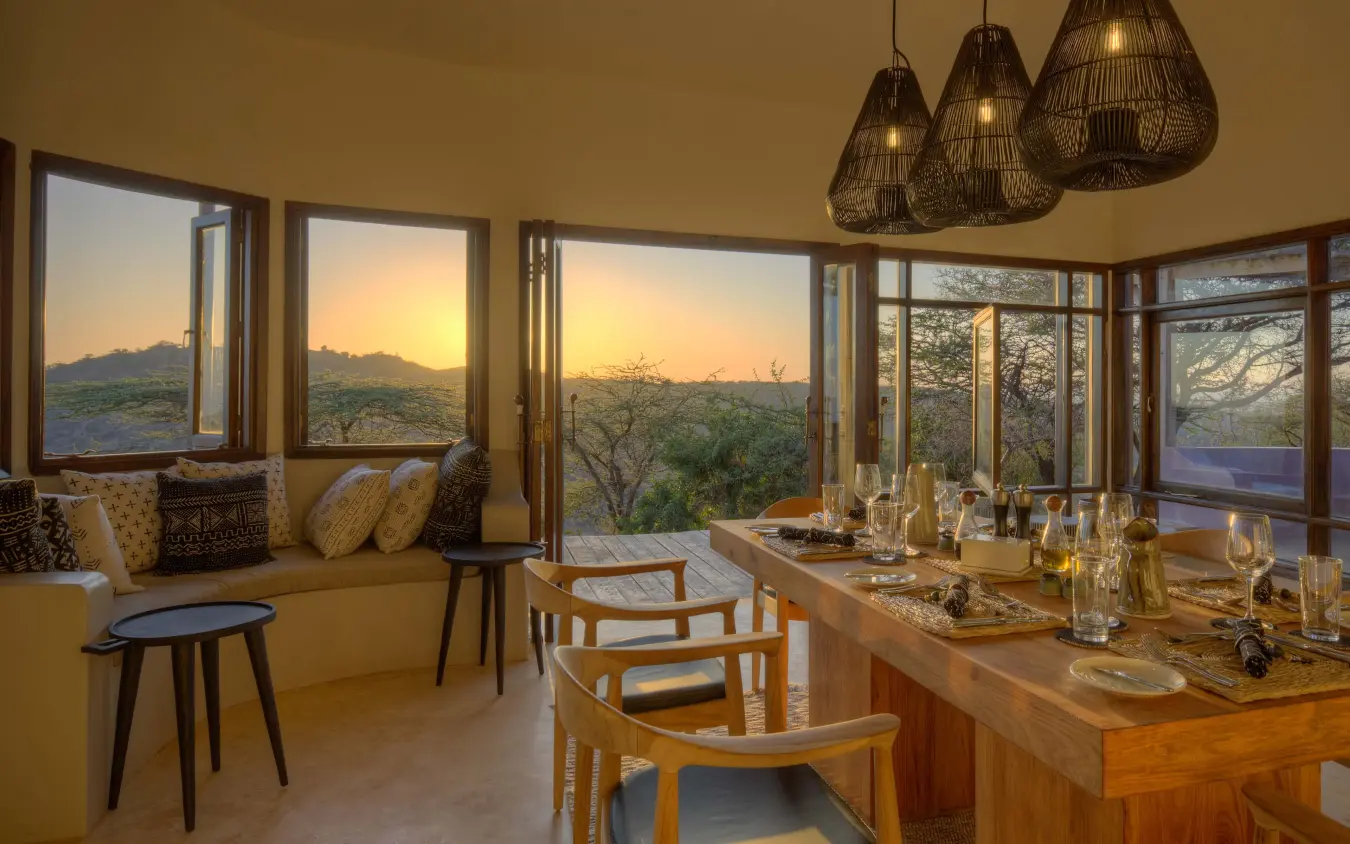 Dining room with sunset views over acacia woodland savanna, Ol Lentille, Laikipia Highlands, Kenya