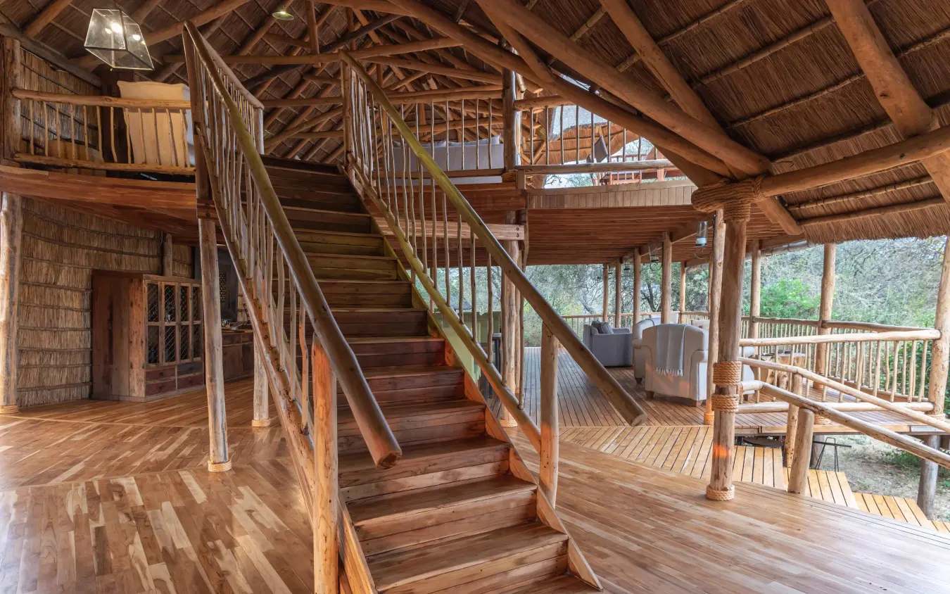 Multi-level wooden interior with stairs and open deck views, Oliver’s Camp, Tarangire National Park, Tanzania