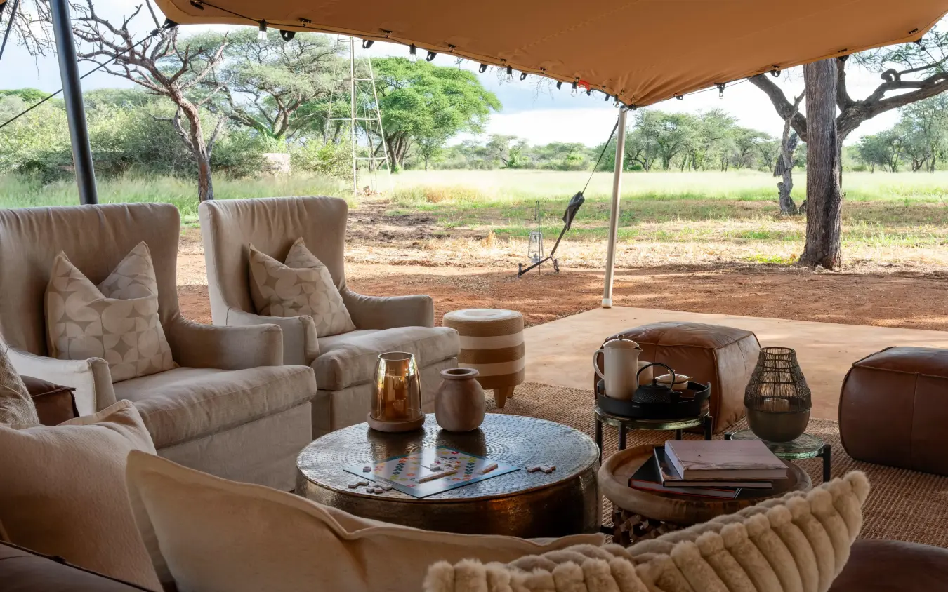 Luxury lounge area with canvas canopy overlooking savanna landscape, Onguma Trails Camp, Etosha National Park, Namibia