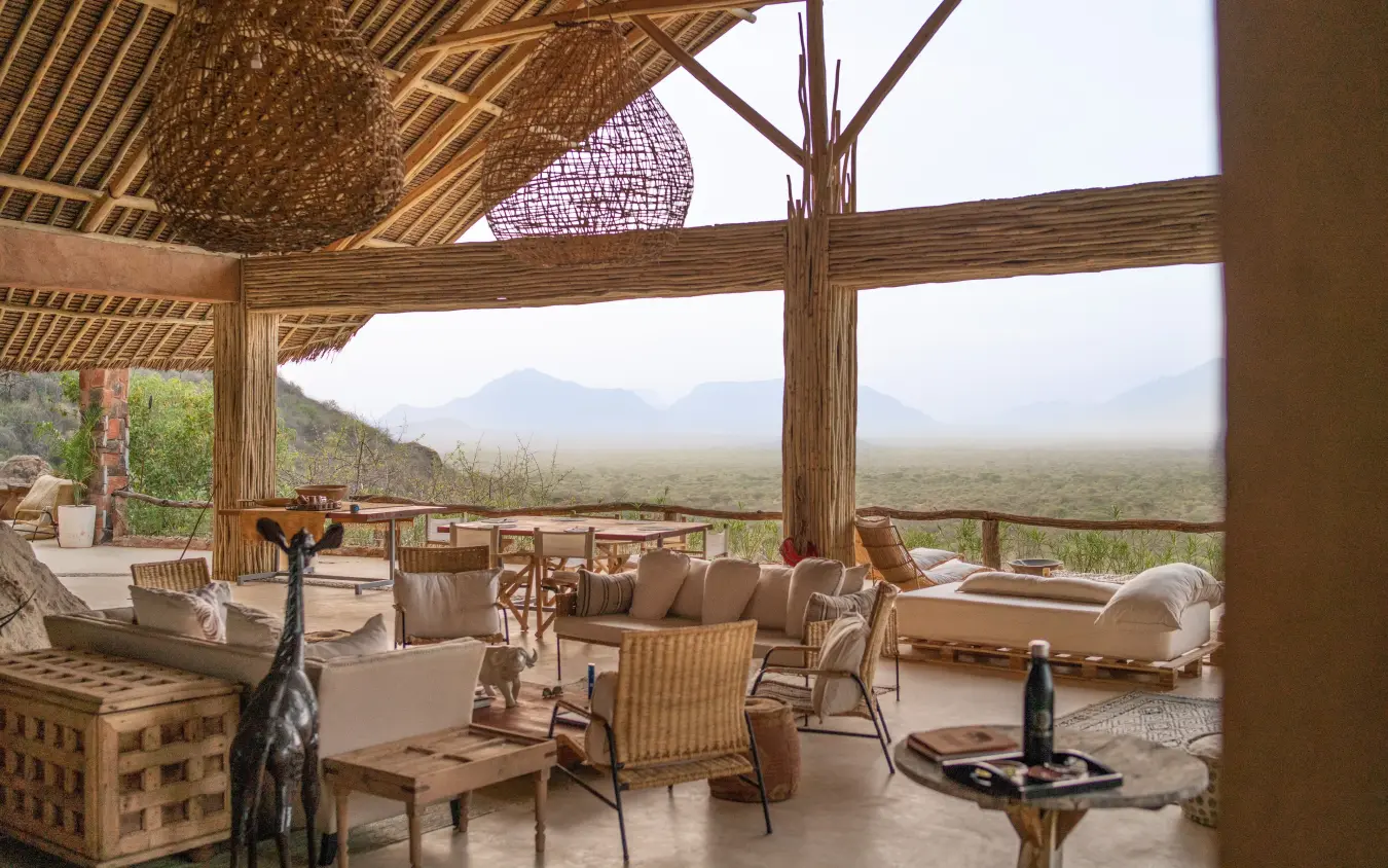 Open-air lounge with views of distant mountains and plains, Reteti House, Northern Kenya, Kenya