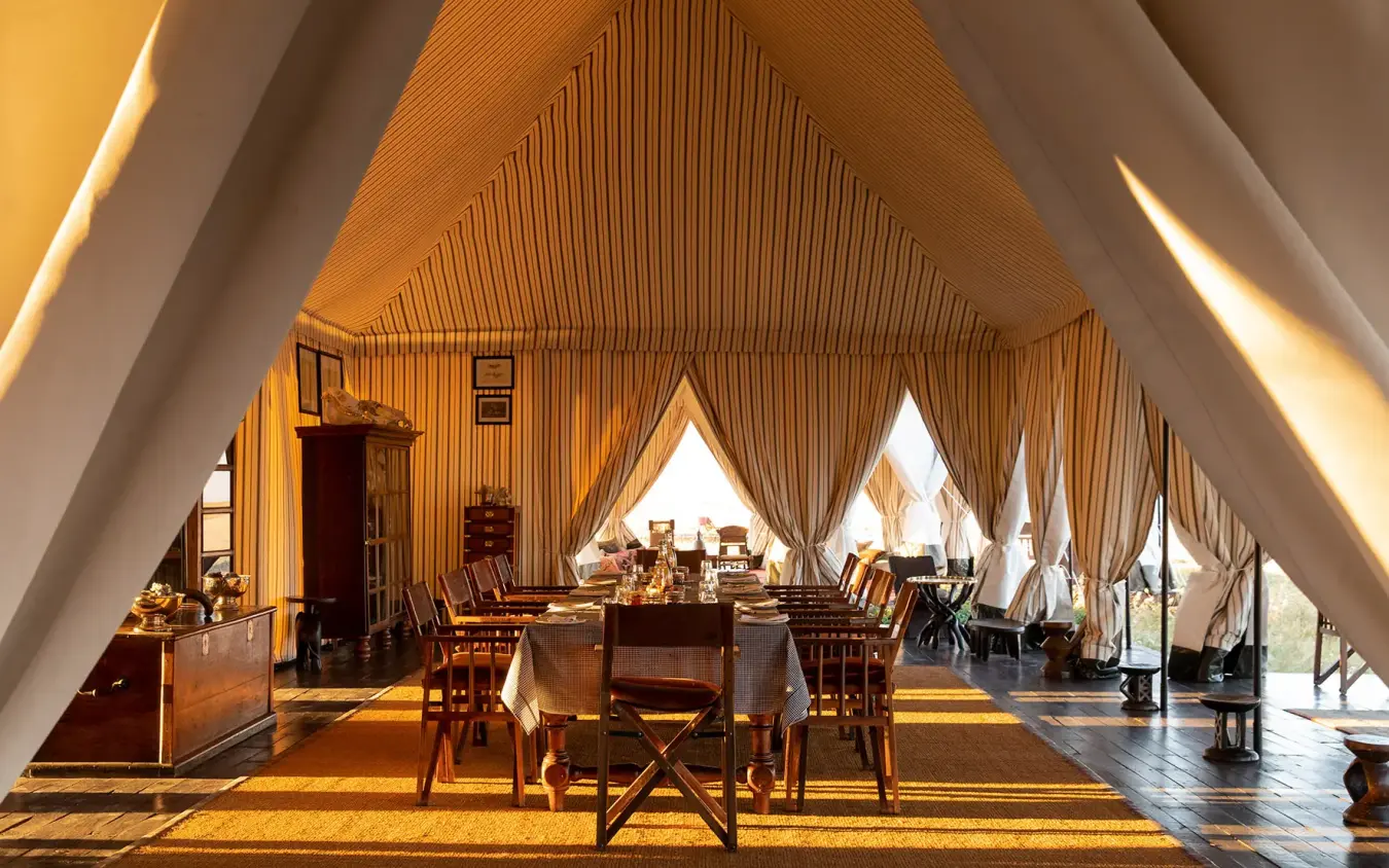Interior view of canvas tent dining and lounge area, San Camp, Makgadikgadi Pans, Botswana