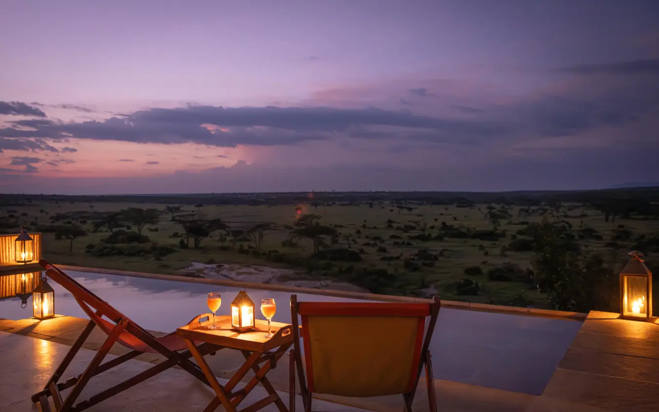 Sunset view from deck overlooking savanna landscape, Eagle View Camp, Maasai Mara, Kenya