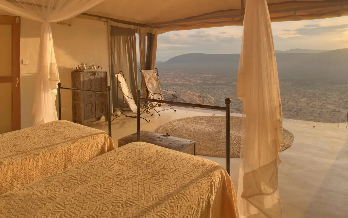 Bedroom with four-poster bed overlooking savanna landscape, Saruni Samburu, Samburu Reserve, Kenya