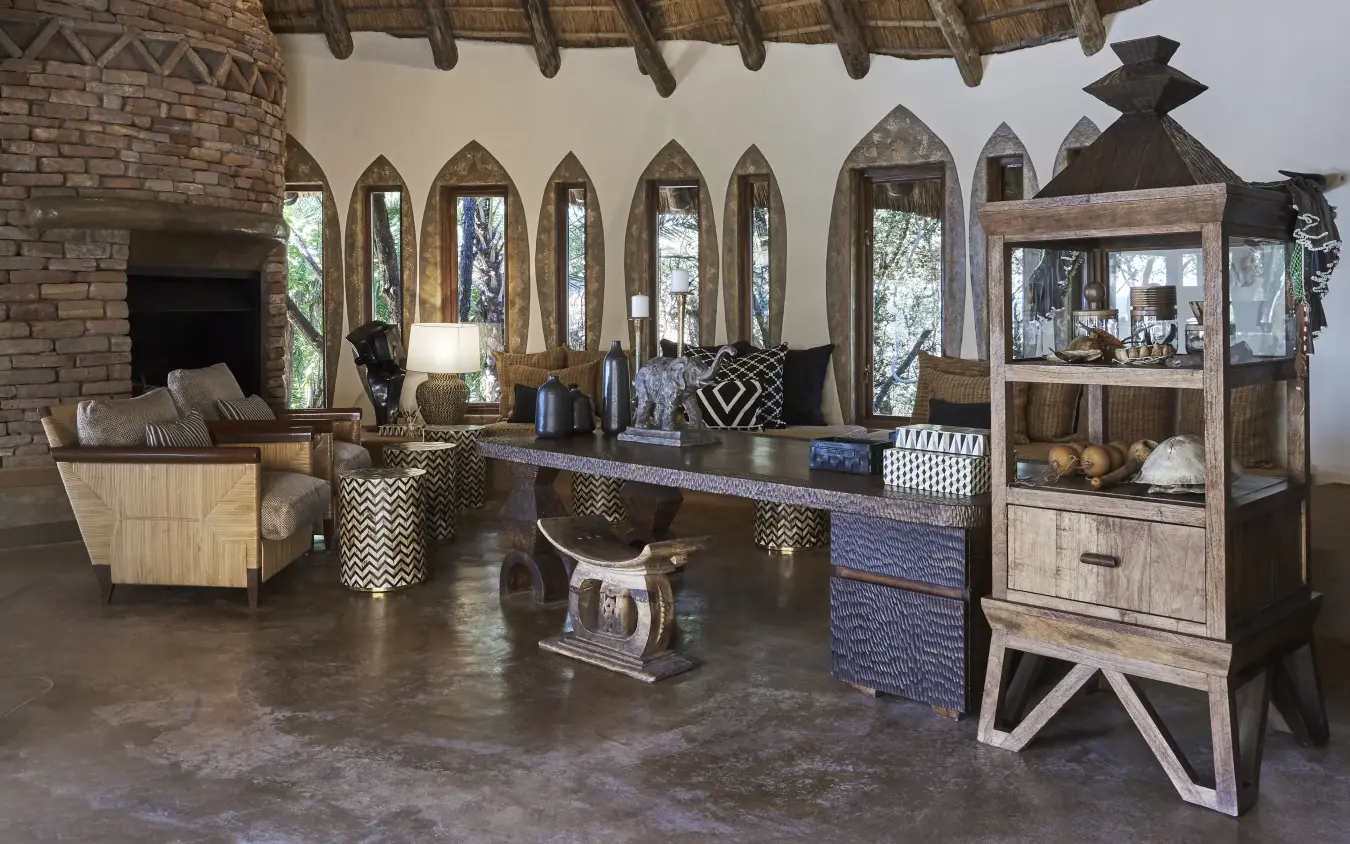 Interior lounge with arched windows and thatched ceiling, Singita Pamushana, Gonarezhou & Malilangwe, Zimbabwe