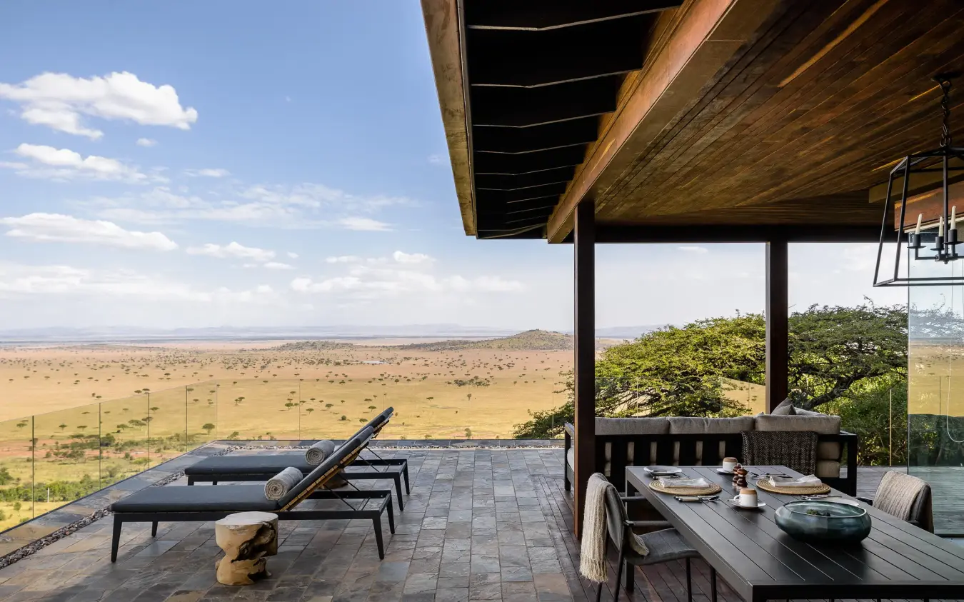 Elevated deck overlooking vast savanna plains landscape, Singita Sasakwa Lodge, Serengeti National Park, Tanzania