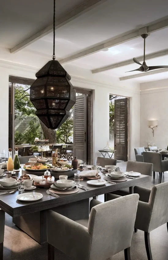 Elegant dining room with table settings and ocean views, Sirai Beach, Kilifi, Kenya