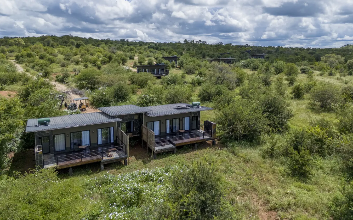 Modern safari lodge pavilions nestled among acacia trees in bushveld landscape, Tarangire Elephant Springs, Tarangire National Park, Tanzania