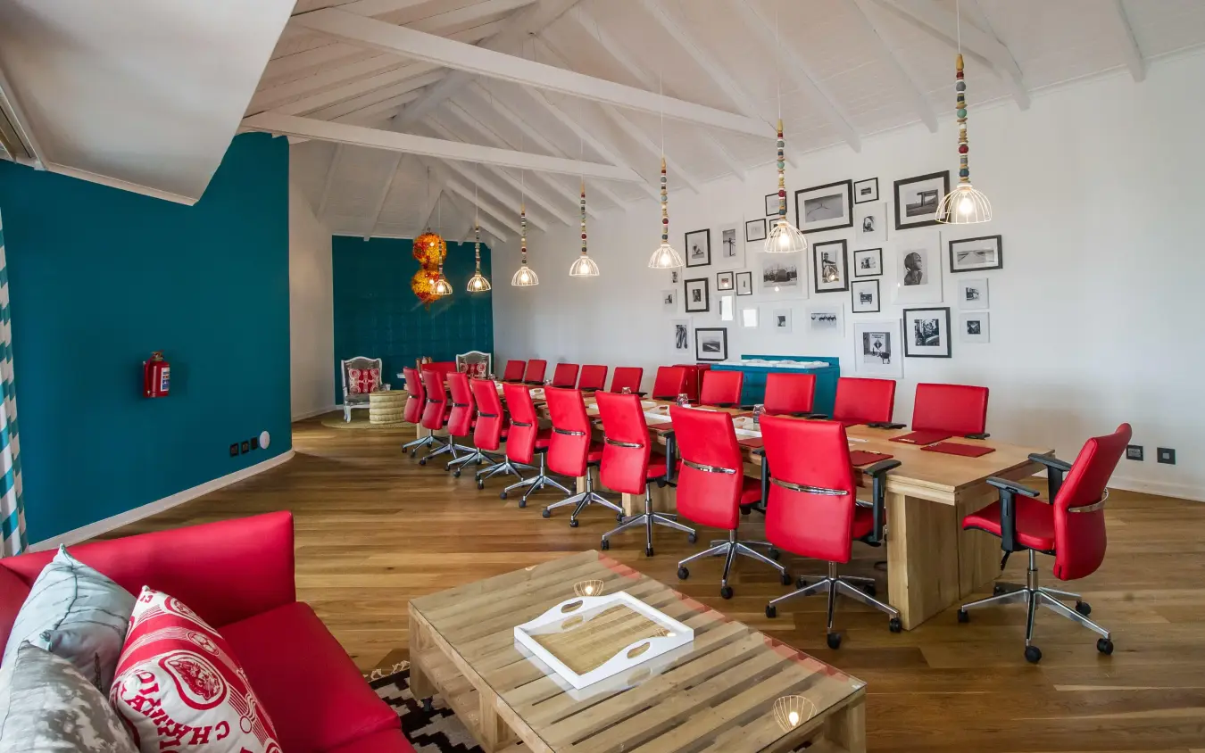 Modern meeting room with red chairs and exposed beam ceiling, The Delight Swakopmund, Swakopmund, Namibia