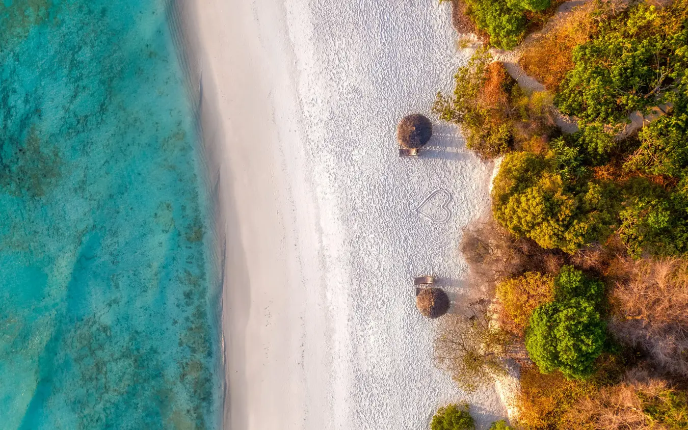 Aerial view of white sand beach with turquoise waters, The Manta Resort, Zanzibar & Pemba, Tanzania