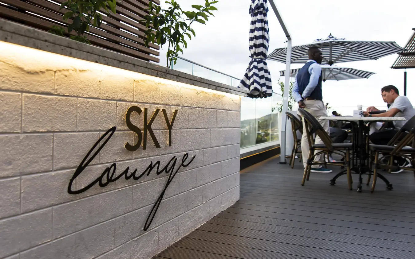 Rooftop lounge terrace with city views and shade structures, Windhoek, Namibia