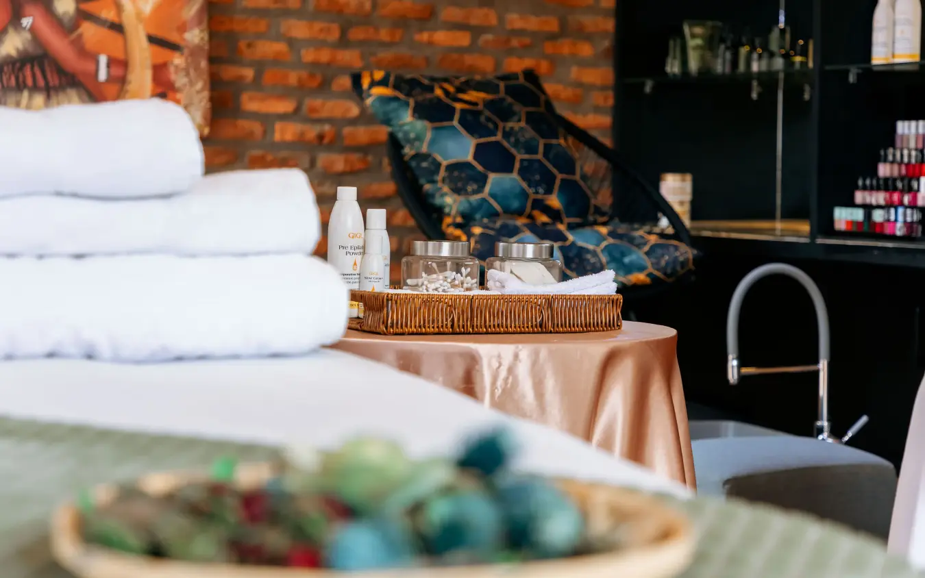 Spa bathroom vanity with towels and amenities displayed, Villa Kigali, Kigali, Rwanda