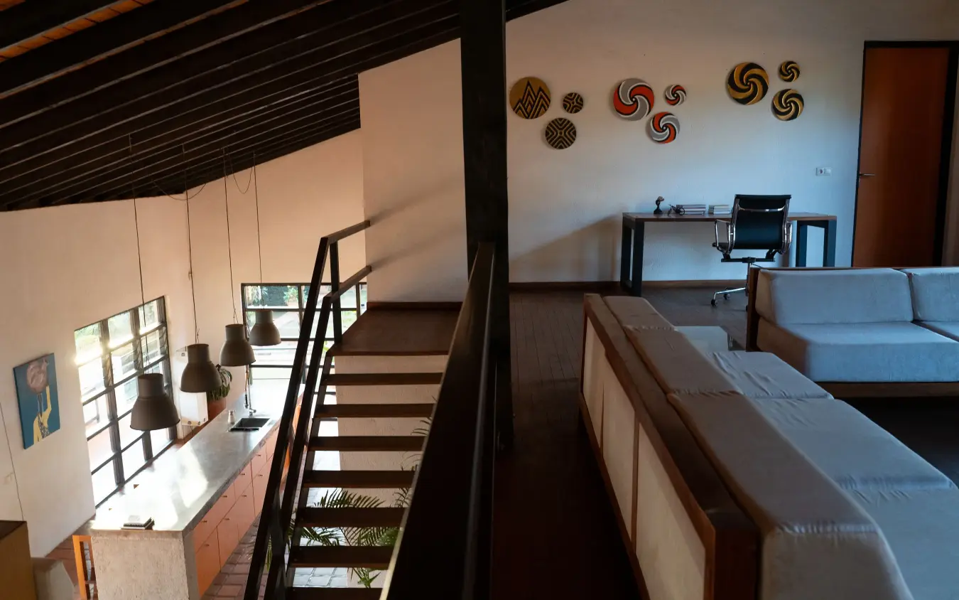 Open-plan living space with mezzanine level and natural light, Villa Kigali, Kigali, Rwanda