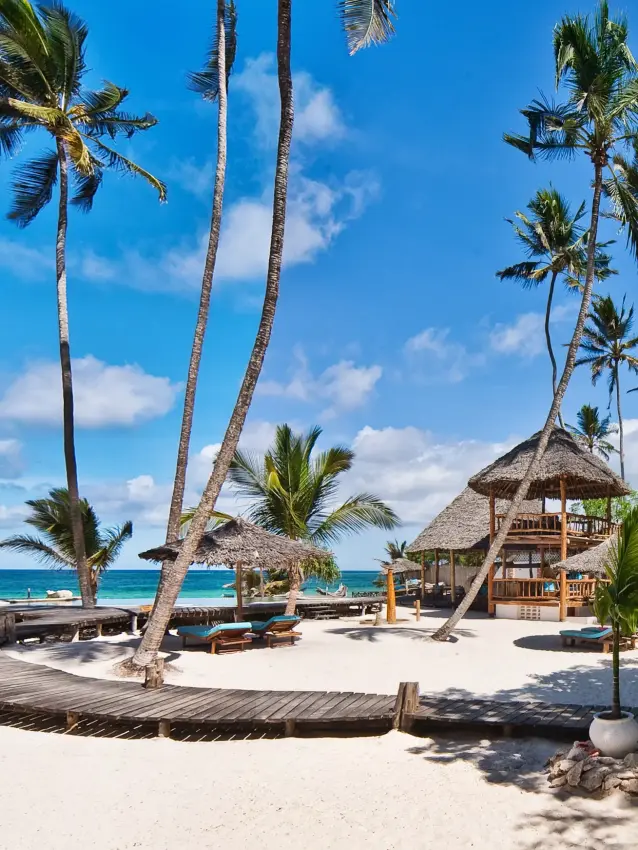 Beach resort with palm trees and ocean access, Waterlovers Beach Resort, Diani Beach, Kenya