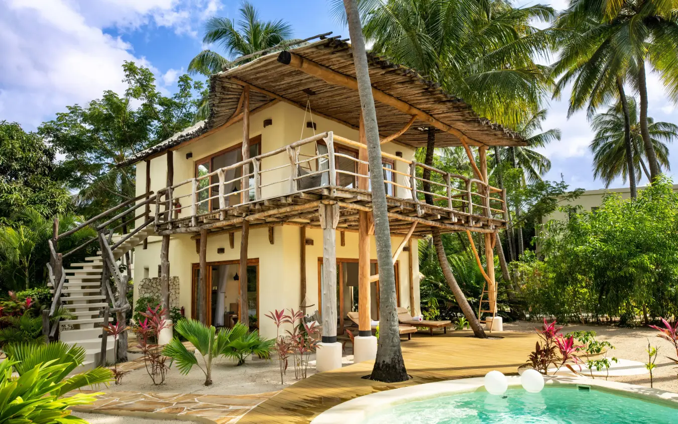 Two-story beachfront villa with pool and palm trees, White Sand Luxury Villas & Spa, Zanzibar & Pemba, Tanzania