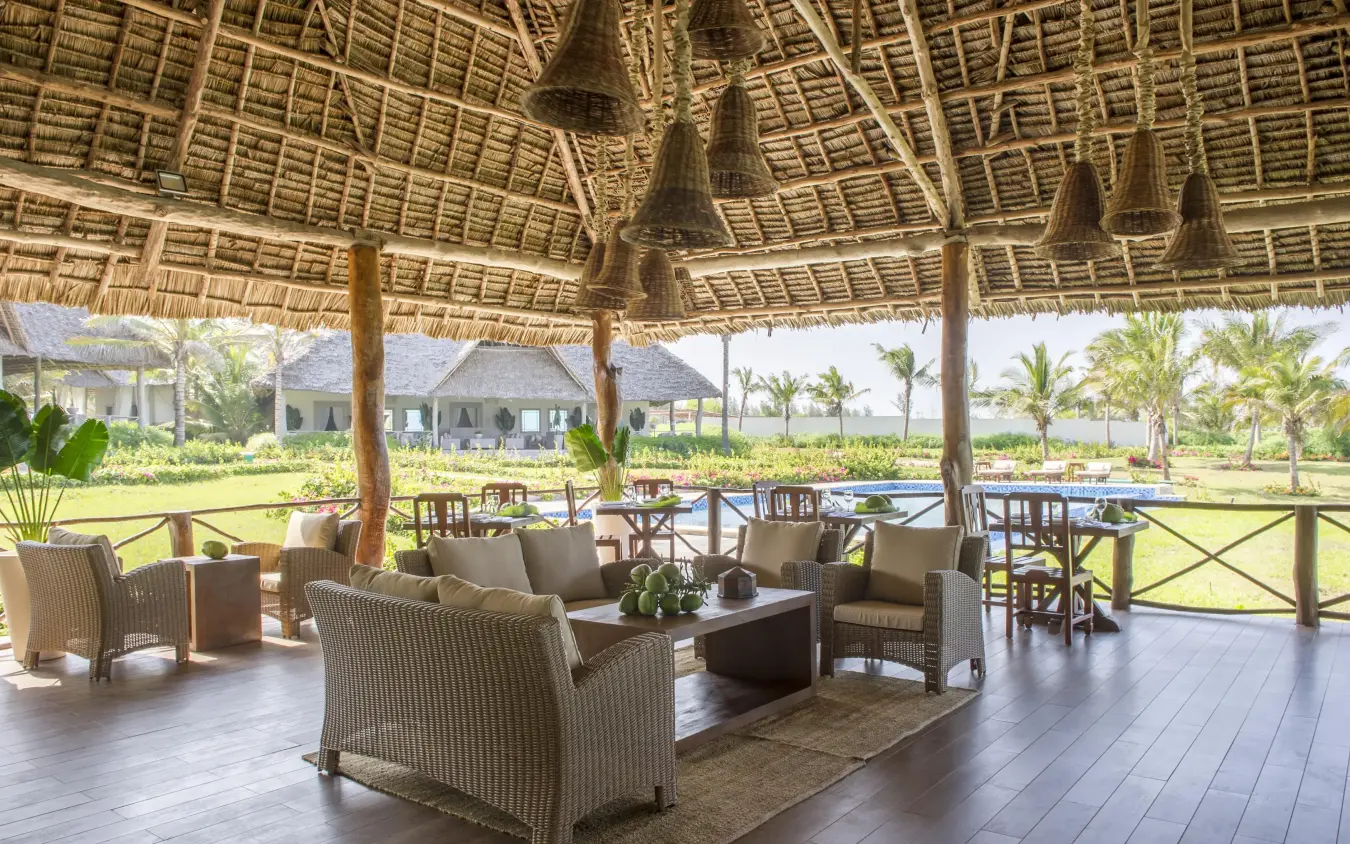Thatched pavilion lounge overlooking manicured grounds and pool, Zawadi Hotel, Zanzibar & Pemba, Tanzania