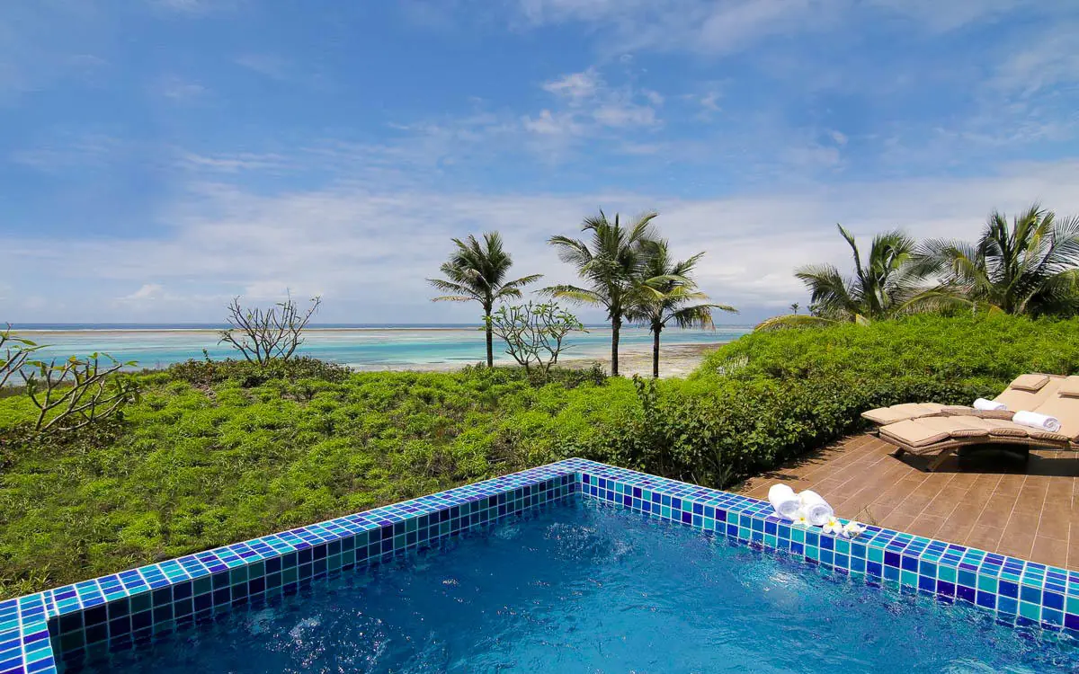 Oceanfront swimming pool overlooking turquoise waters and beach, Zawadi Hotel, Zanzibar & Pemba, Tanzania