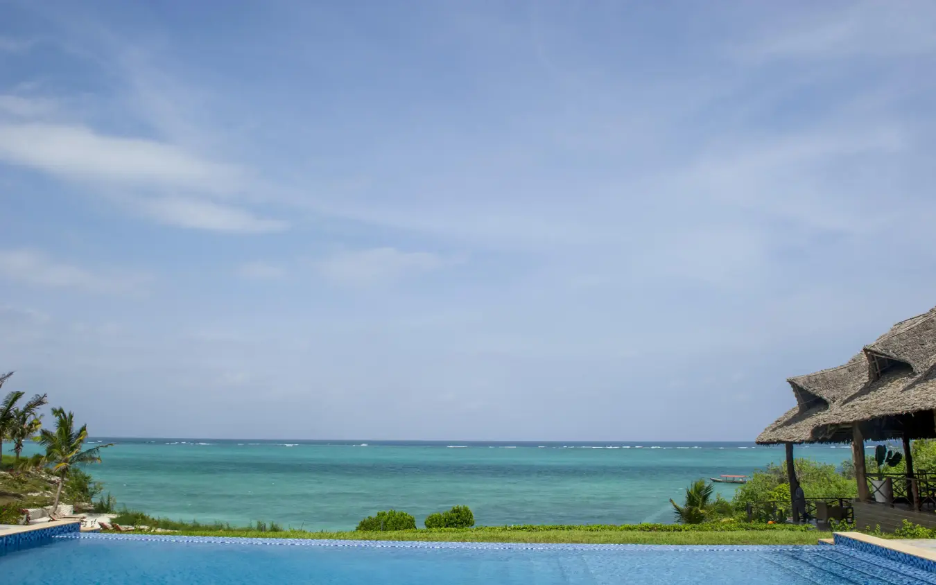 Oceanfront swimming pool overlooking turquoise tropical waters, Zawadi Hotel, Zanzibar & Pemba, Tanzania