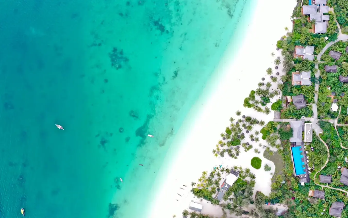 Aerial view of beachfront resort with turquoise ocean and white sand, Zuri Zanzibar, Zanzibar & Pemba, Tanzania