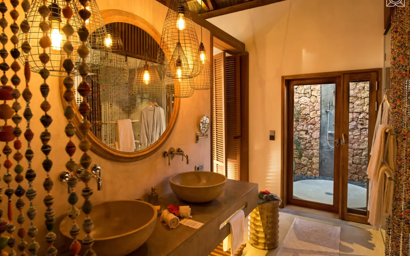 Luxurious bathroom with dual vessel sinks and beaded curtains, Zuri Zanzibar, Zanzibar & Pemba, Tanzania