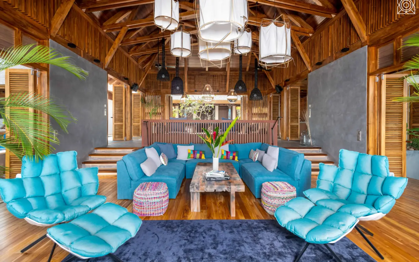 Spacious lounge with turquoise seating and wooden beams, Zuri Zanzibar, Zanzibar & Pemba, Tanzania