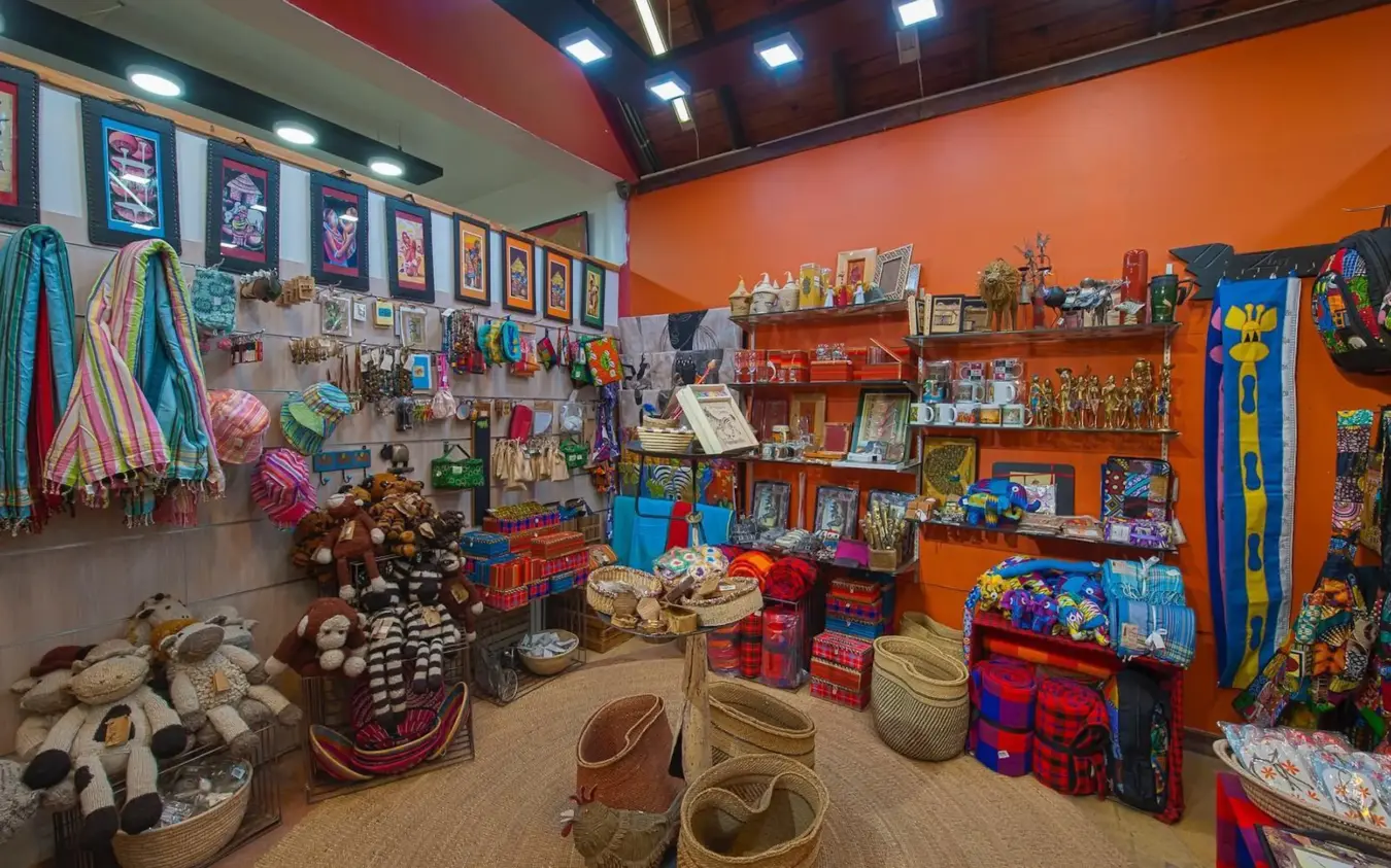 Colorful artisan craft shop with textiles, baskets and decorative items, Hamerkop House, Arusha, Tanzania