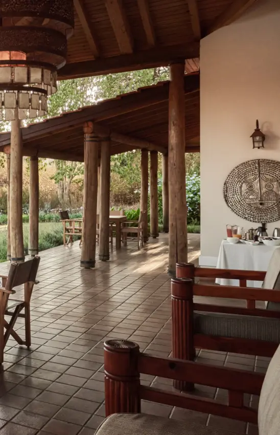 Outdoor dining pavilion with mountain views and manicured gardens, Legendary Lodge, Arusha, Tanzania